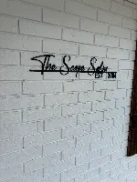 The S-Cape Salon logo