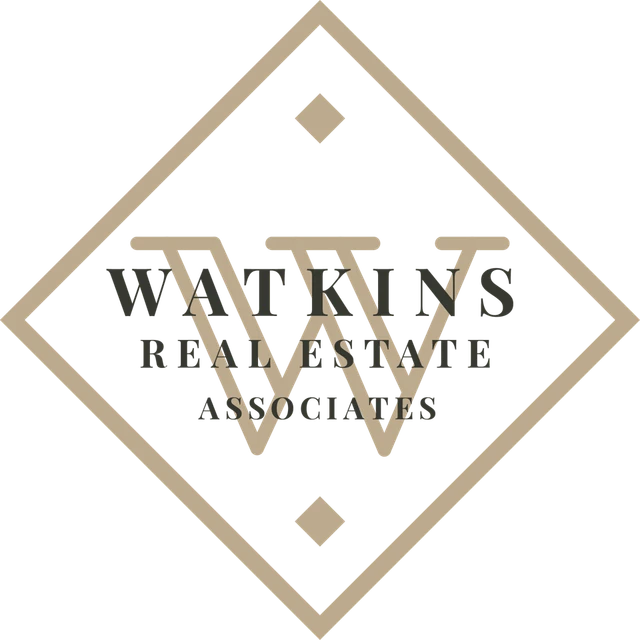 Watkins Real Estate Associates logo