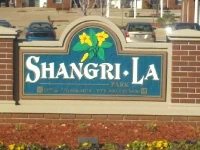 Shangri La Park Apartments logo