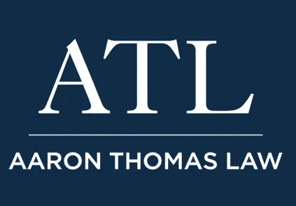 Aaron Thomas Law logo